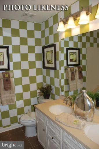 4233 Forge Road Perry Hall, MD 21128 - Photo 19 of 28 a bathroom with a sink toilet and shower
