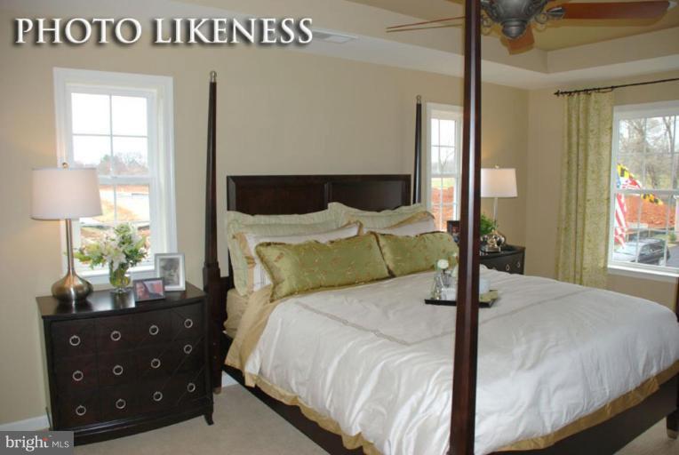 4233 Forge Road Perry Hall, MD 21128 - Photo 23 of 28 a bedroom with a bed and window
