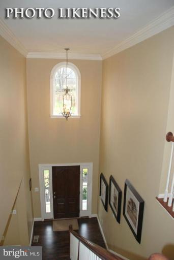 4233 Forge Road Perry Hall, MD 21128 - Photo 28 of 28 a view of an entryway with wooden floor