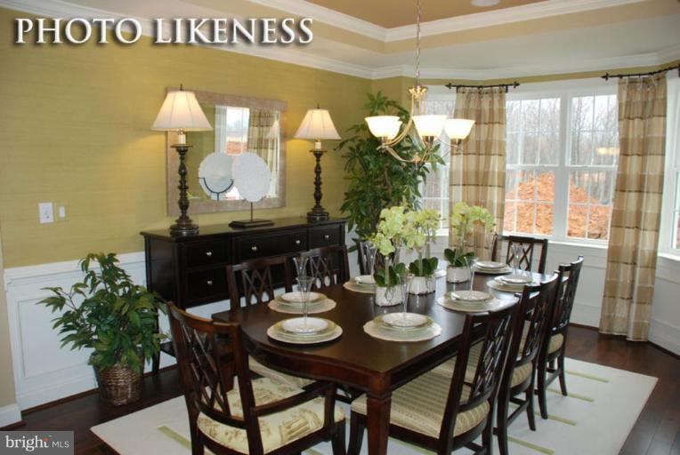 4233 Forge Road Perry Hall, MD 21128 - Photo 8 of 28 a view of a dining table and chairs in the patio