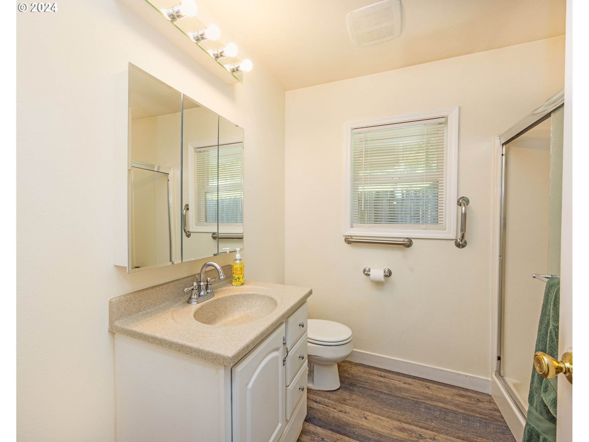 37232 Wallace Creek Road Springfield, OR 97478 - Photo 33 of 45 a bathroom with a sink toilet and shower