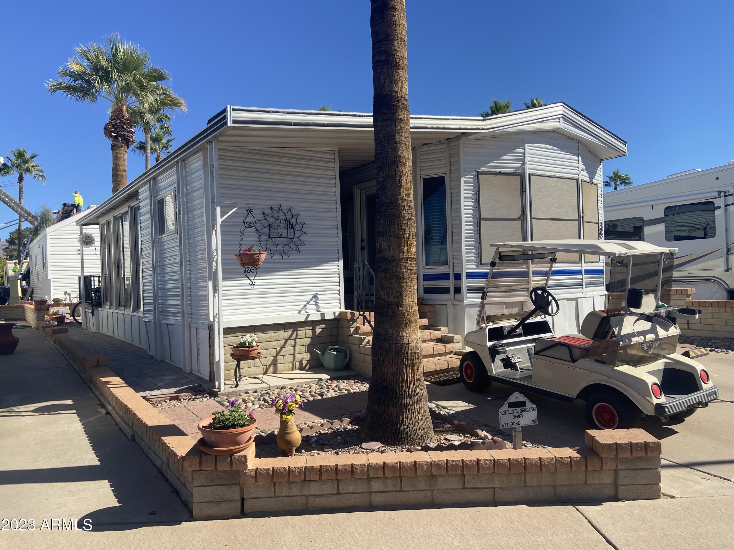 3301 South Goldfield Road Apache Junction, AZ 85119 - Photo 26 of 45 a building outdoor space with patio furniture