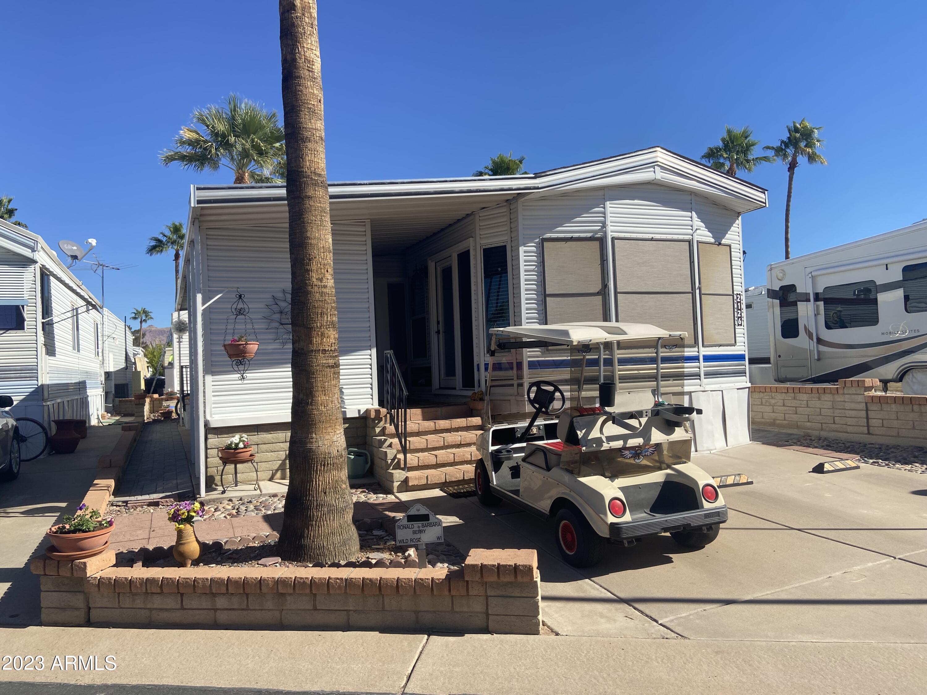 3301 South Goldfield Road Apache Junction, AZ 85119 - Photo 27 of 45 a view of a car park in front of a building