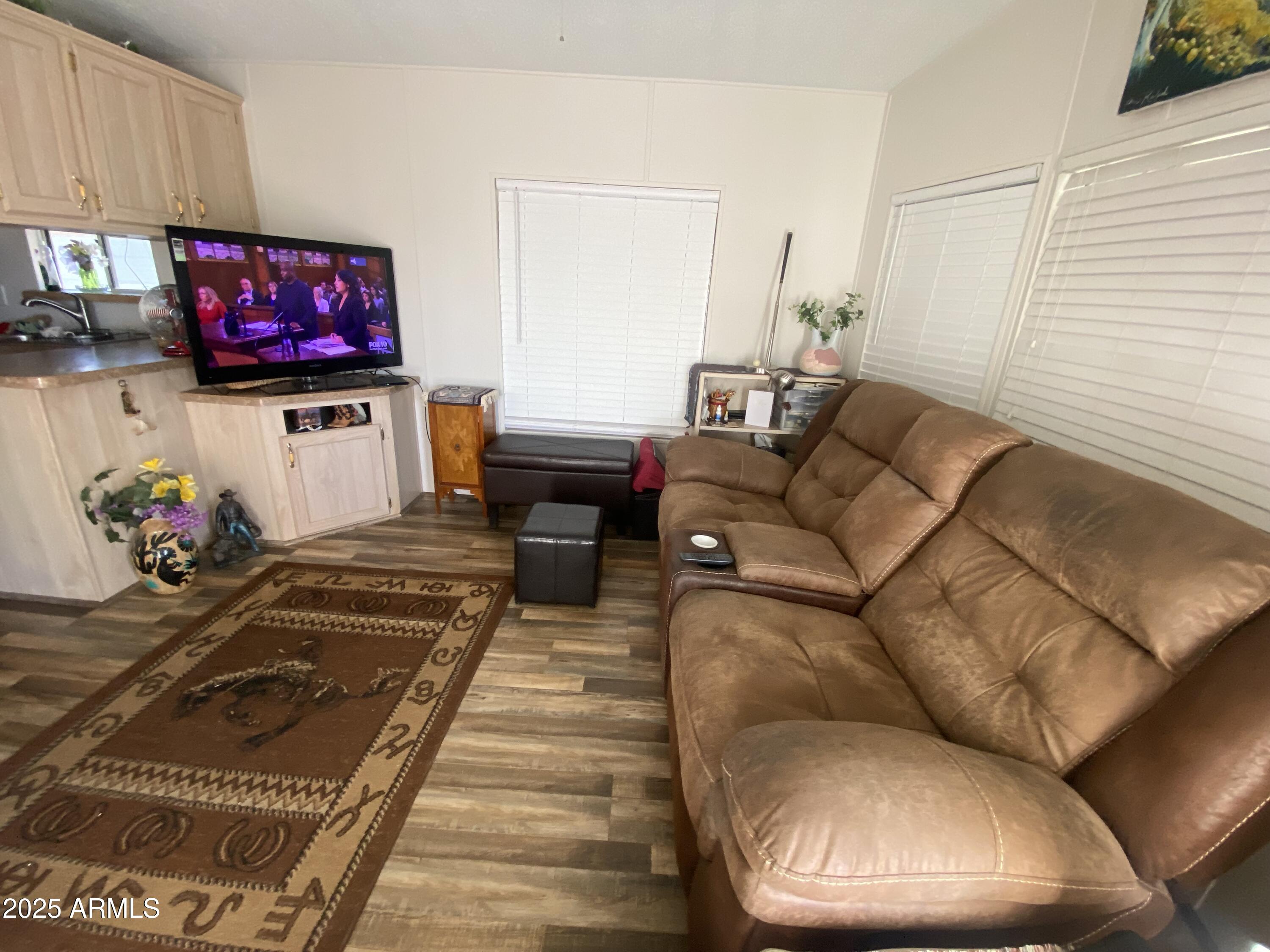 3301 South Goldfield Road Apache Junction, AZ 85119 - Photo 4 of 45 a living room with furniture