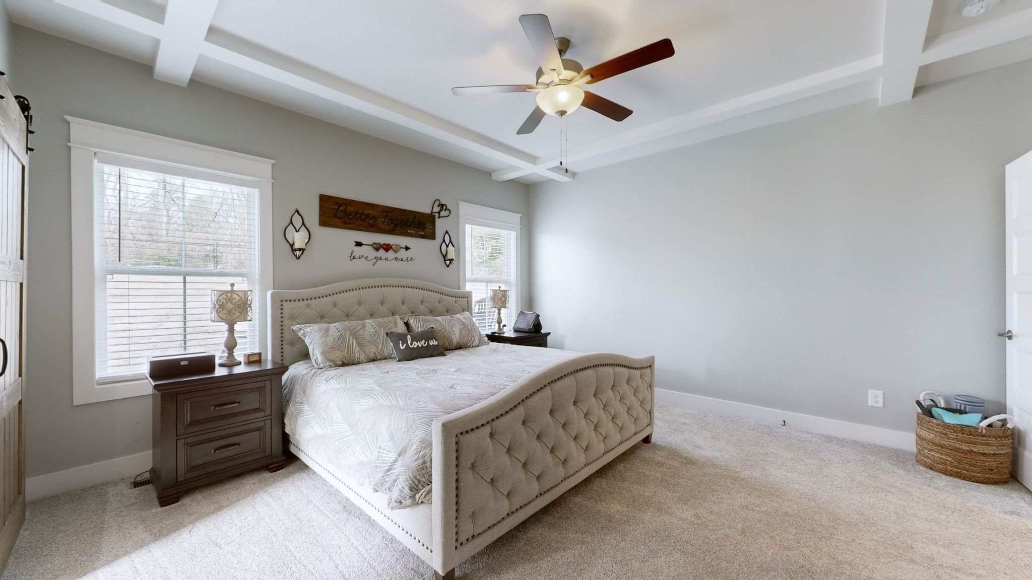 147 Enoch Way Gallatin, TN 37066 - Photo 16 of 60 a bedroom with a bed and a chandelier