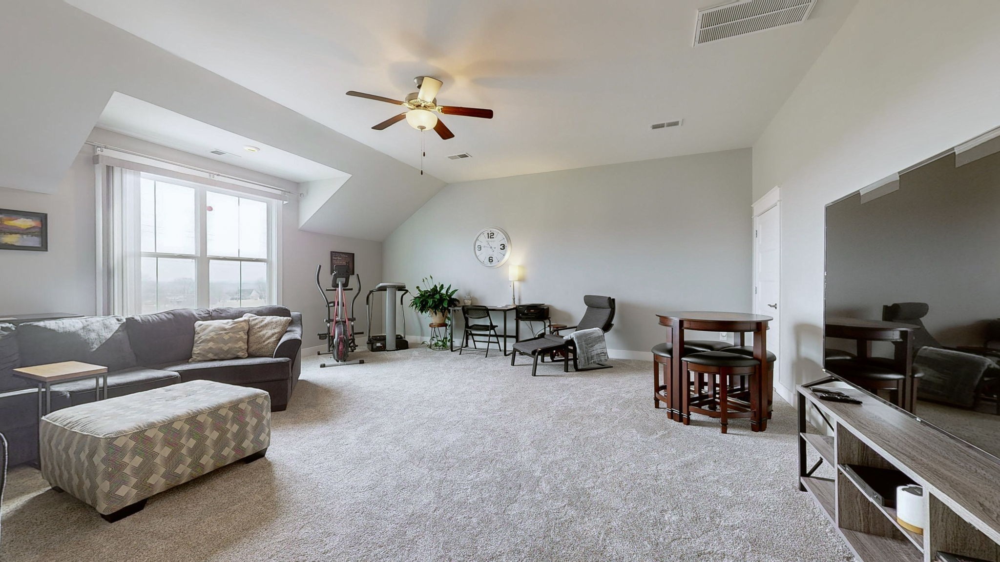 147 Enoch Way Gallatin, TN 37066 - Photo 22 of 60 a living room with furniture and a chandelier