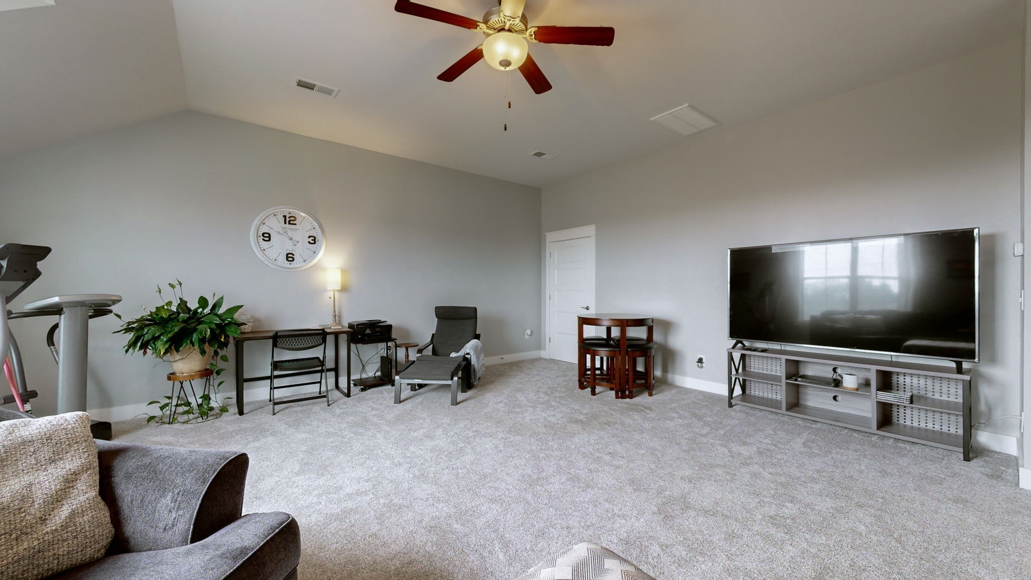147 Enoch Way Gallatin, TN 37066 - Photo 24 of 60 a living room with furniture and a flat screen tv