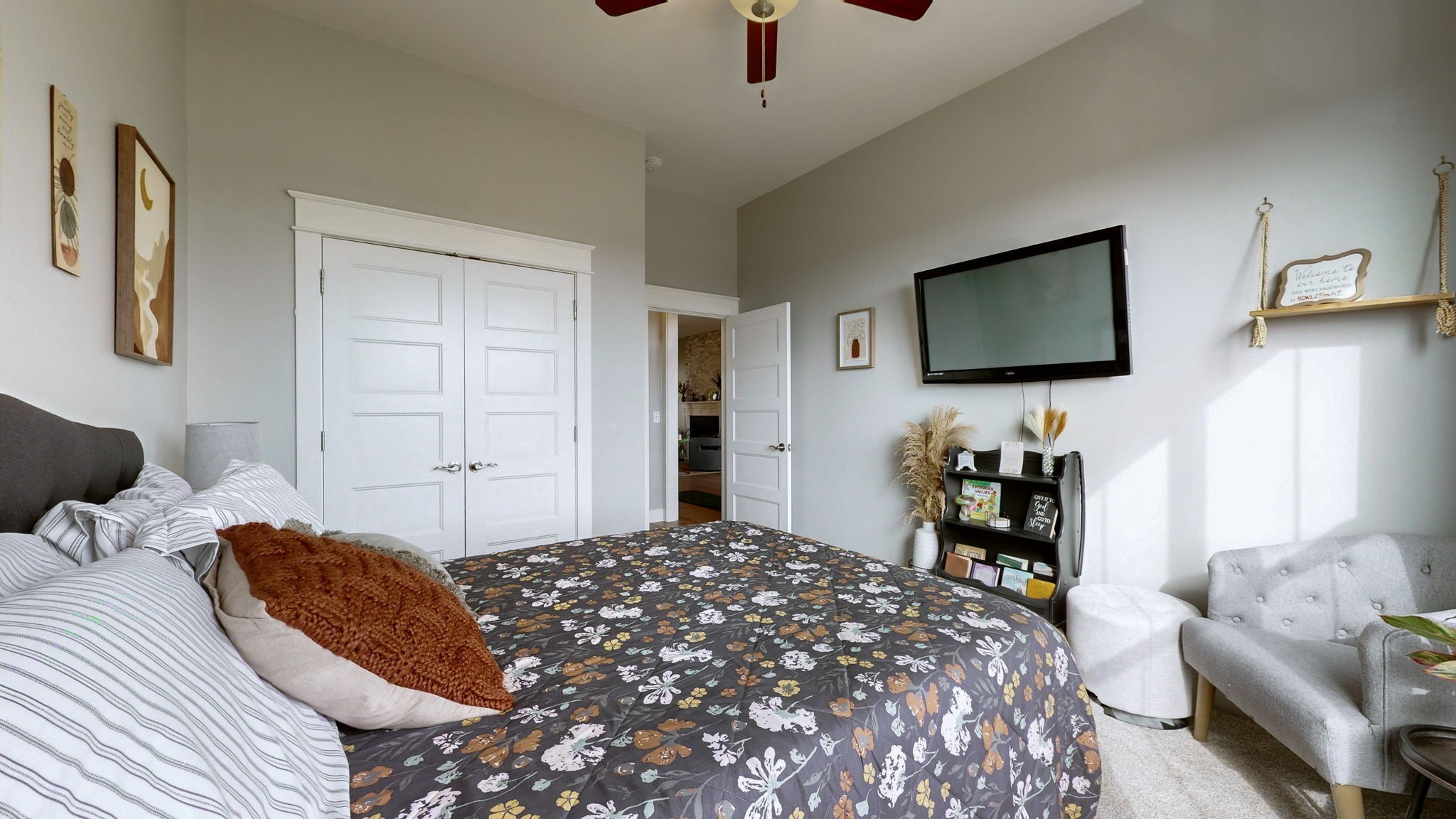 147 Enoch Way Gallatin, TN 37066 - Photo 26 of 60 a bedroom with a bed and a flat screen tv