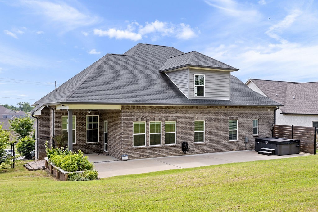 147 Enoch Way Gallatin, TN 37066 - Photo 46 of 60 a front view of a house with yard and porch