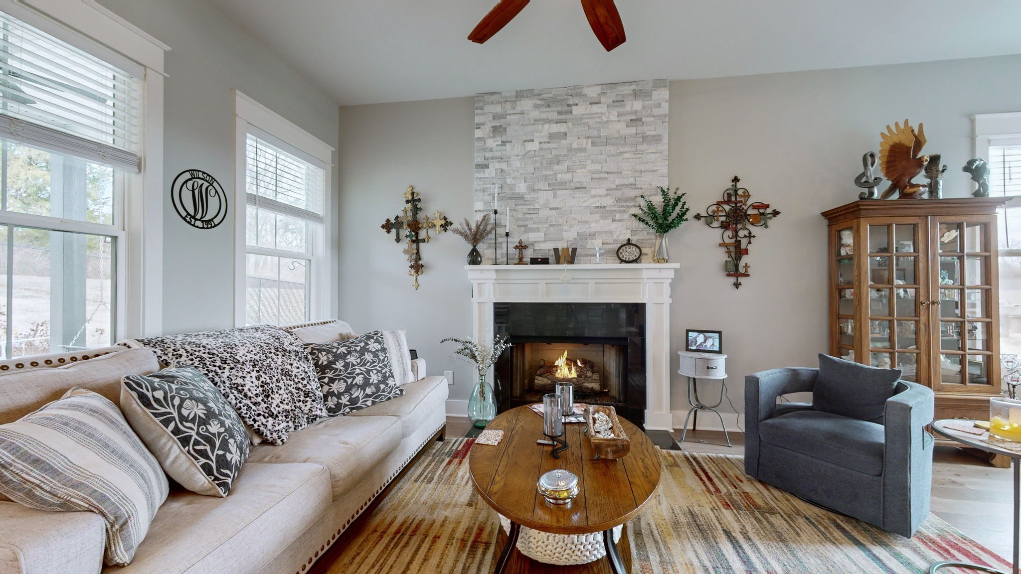 147 Enoch Way Gallatin, TN 37066 - Photo 5 of 60 a living room with furniture and a fireplace
