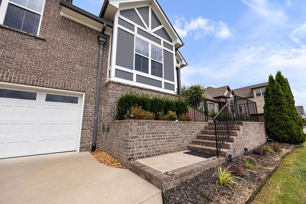 147 Enoch Way Gallatin, TN 37066 - Photo 54 of 60 a backyard of a house with lots of green space