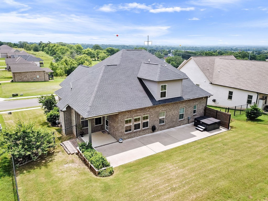 147 Enoch Way Gallatin, TN 37066 - Photo 58 of 60 an aerial view of a house with swimming pool and large trees