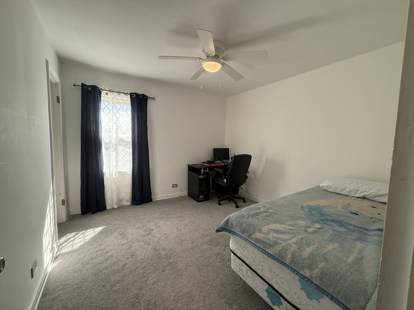 14280 Linder Avenue Midlothian, IL 60445 - Photo 13 of 19 a bed room with a bed and a piano