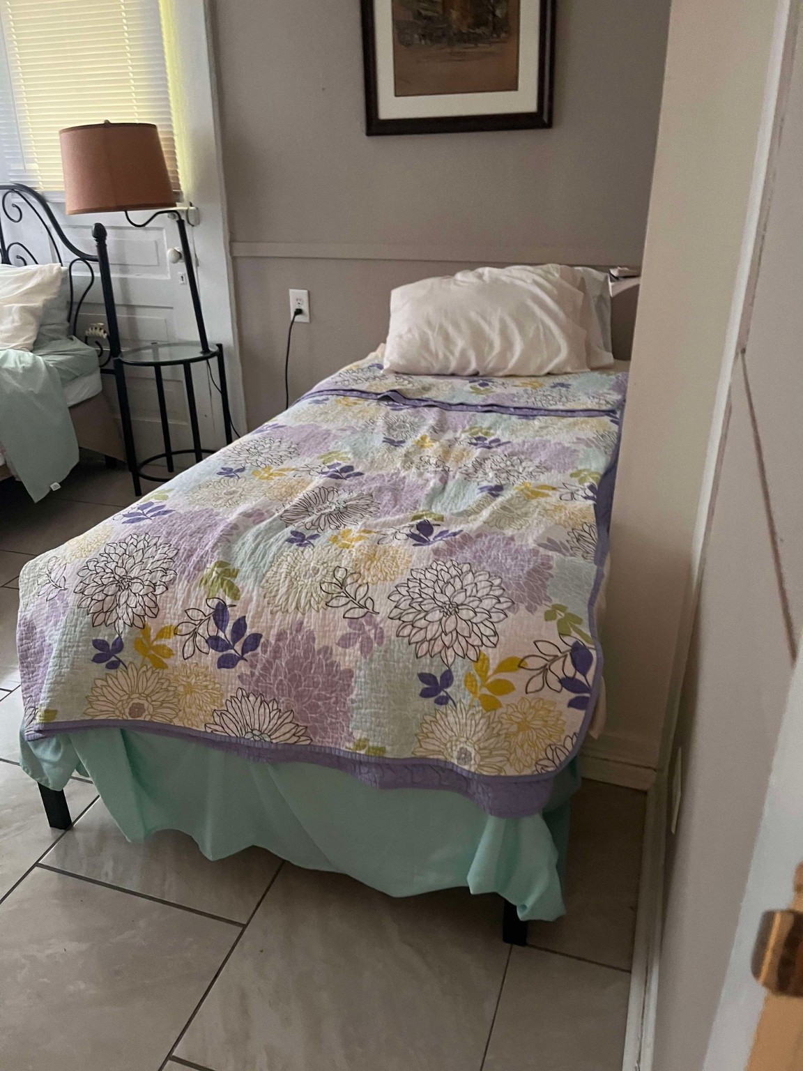 435 East Ave J Silsbee, TX 77656 - Photo 12 of 34 a bedroom with a bed and a chair