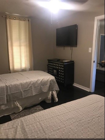 435 East Ave J Silsbee, TX 77656 - Photo 23 of 34 a bedroom with a bed and a flat screen tv
