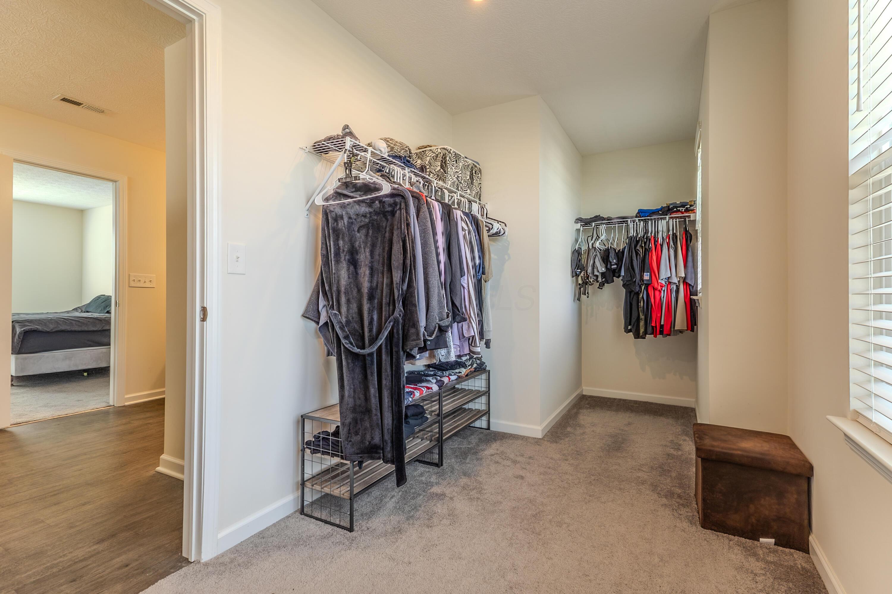 307 Honeysuckle Road Ashville, OH 43103 - Photo 26 of 37 Primary Suite Walk-In Closet
