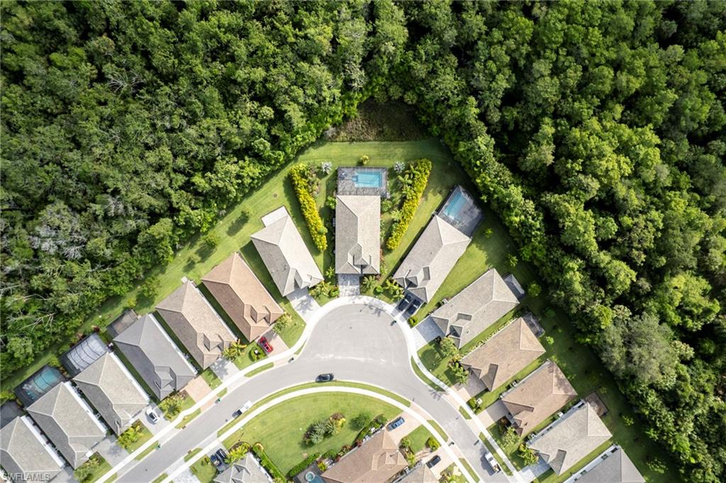 11413 Jacaranda Drive Naples, FL 34120 - Photo 36 of 50 an aerial view of a house with outdoor space and sitting area