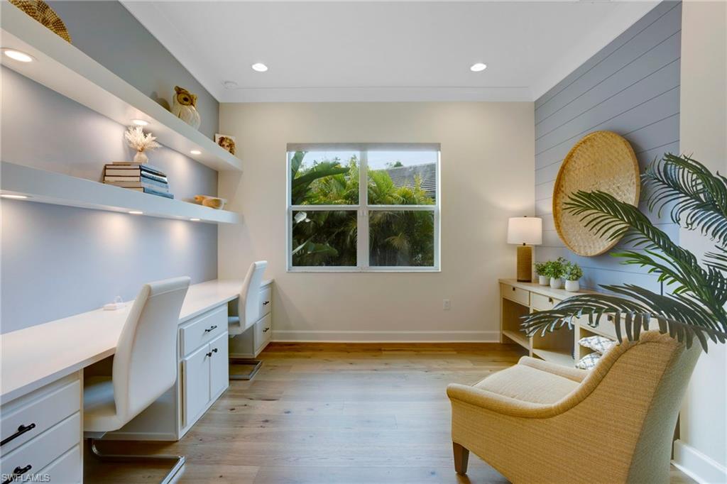 11413 Jacaranda Drive Naples, FL 34120 - Photo 7 of 50 a living room with furniture and a window