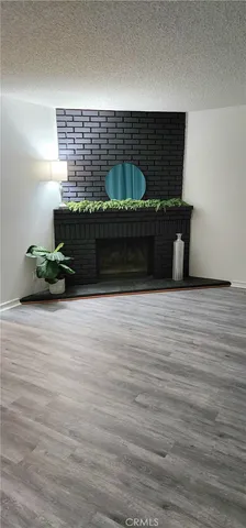 a view of wooden floor and cabinet