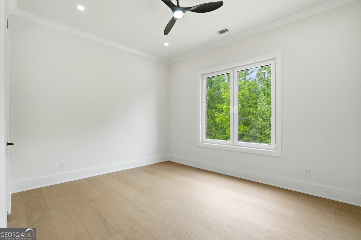 1557 Whitley Road Dacula, GA 30019 - Photo 30 of 46 an empty room with a window