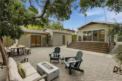 a view of a back yard of the house
