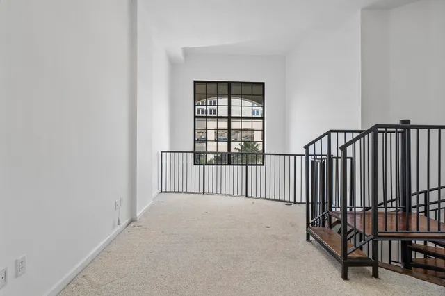 a view of entryway with stairs