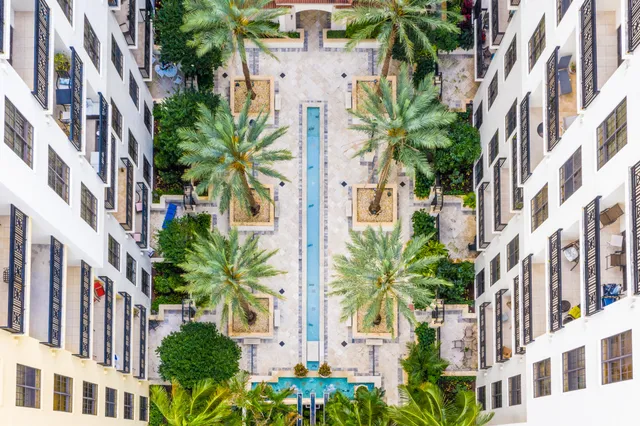 a view of multiple house with a street