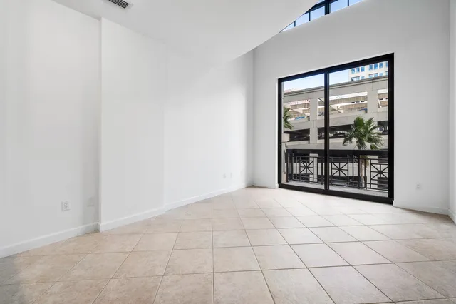 a view of an empty room with a window