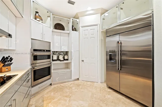 a view of a kitchen washer and dryer in a kitchen