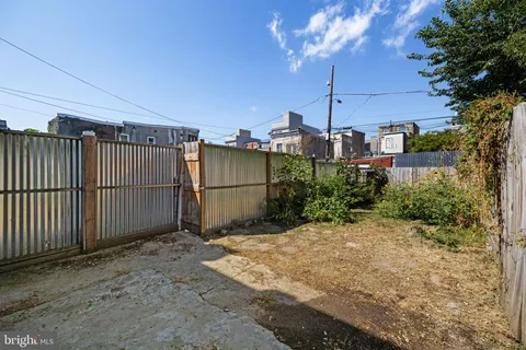 a view of a wooden fence