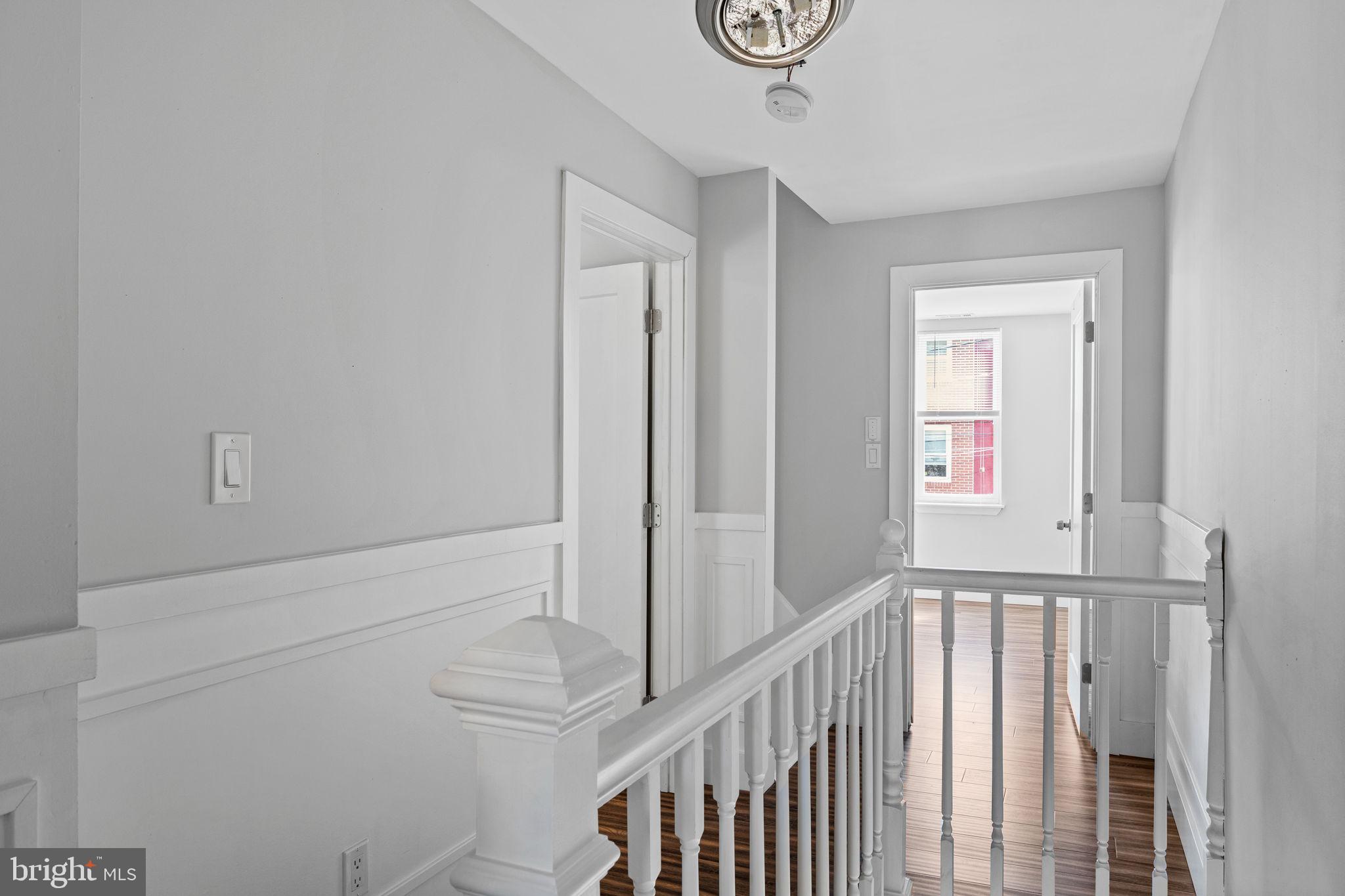 2026 North Lawrence Street Philadelphia, PA 19122 - Photo 18 of 34 a view of a hallway with wooden floor