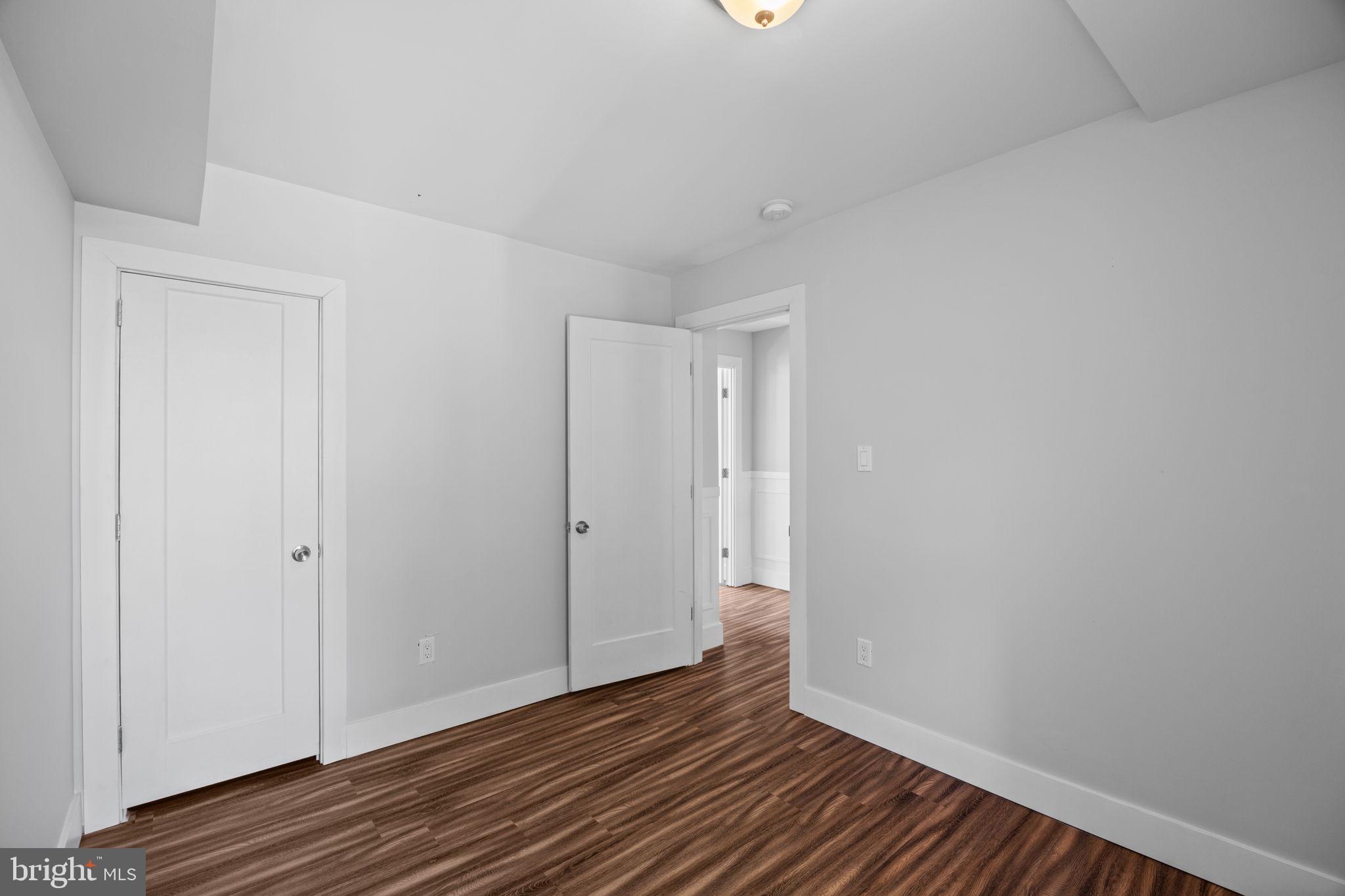 2026 North Lawrence Street Philadelphia, PA 19122 - Photo 21 of 34 a view of an empty room with wooden floor