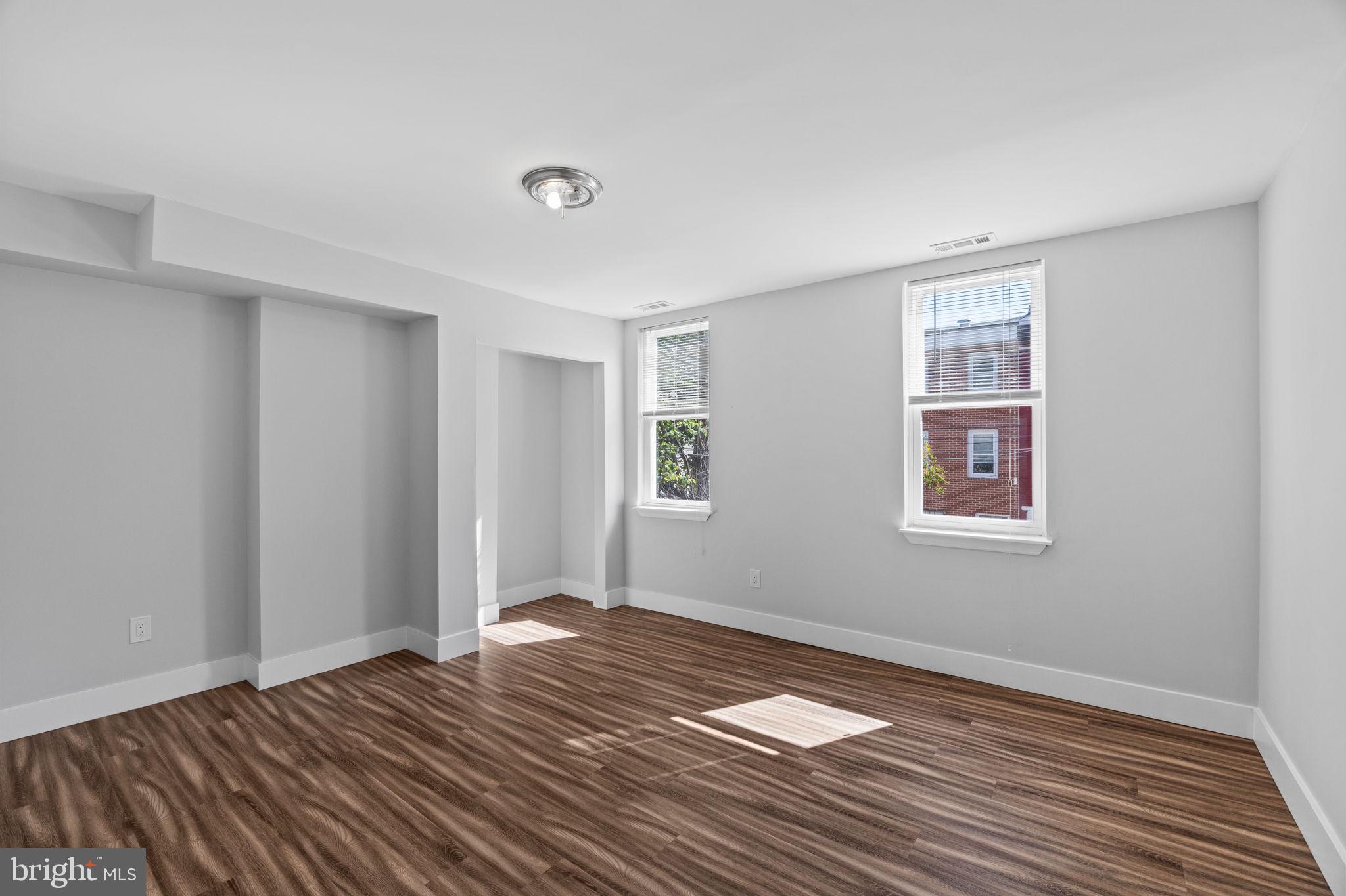 2026 North Lawrence Street Philadelphia, PA 19122 - Photo 23 of 34 a view of a room with wooden floor and window