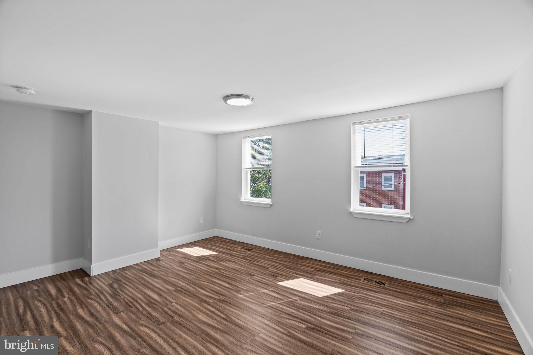 2026 North Lawrence Street Philadelphia, PA 19122 - Photo 27 of 34 a view of empty room with wooden floor and fan
