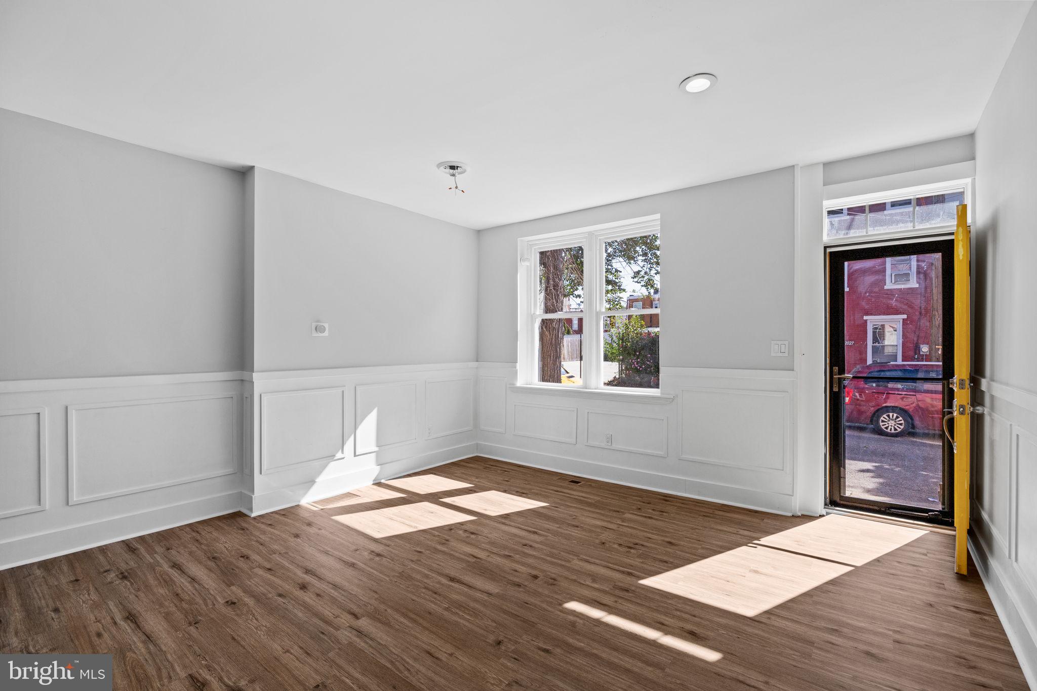 2026 North Lawrence Street Philadelphia, PA 19122 - Photo 5 of 34 a view of empty room with wooden floor and fan
