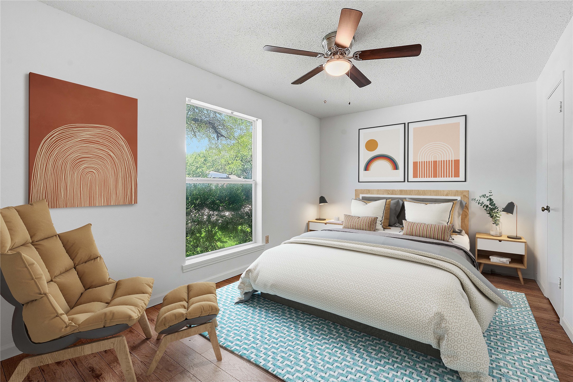6205 Shadow Bend Austin, TX 78745 - Photo 3 of 31 A tranquil bedroom retreat features rich wood flooring and a refreshing ceiling fan.