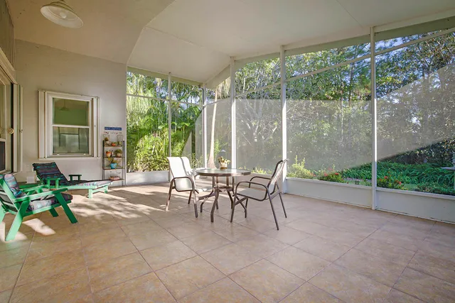 a view of a patio with a yard