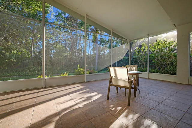 a balcony view with a seating space