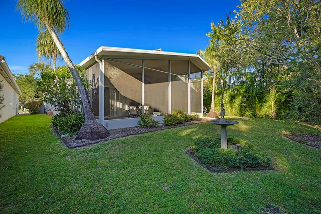 a view of a back yard of the house