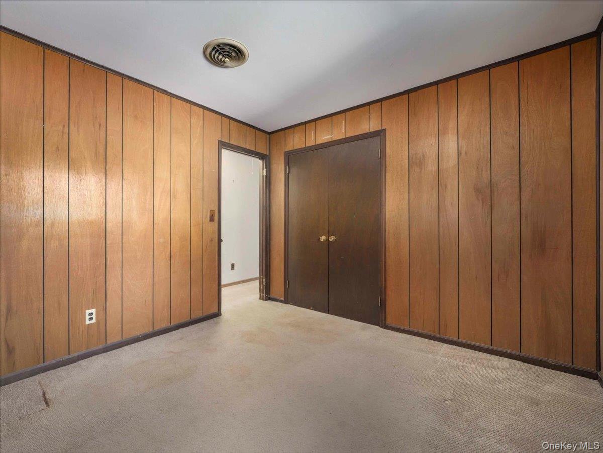 61 Rolling Ridge Road New City, NY 10956 - Photo 22 of 43 a view of an empty room and a window