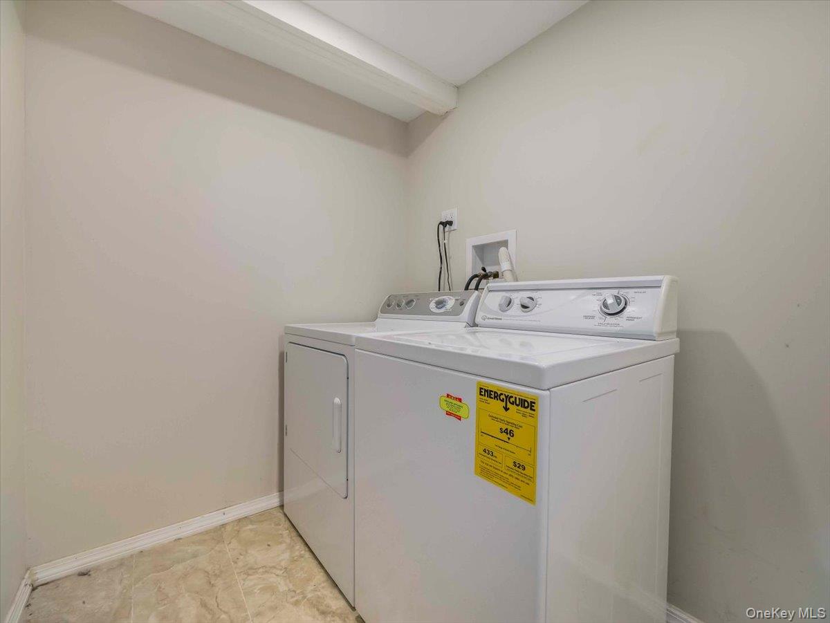 61 Rolling Ridge Road New City, NY 10956 - Photo 27 of 43 a utility room with dryer and washer