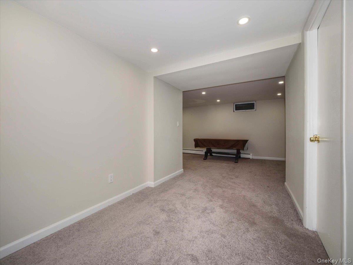 61 Rolling Ridge Road New City, NY 10956 - Photo 28 of 43 a view of a livingroom and a utility room