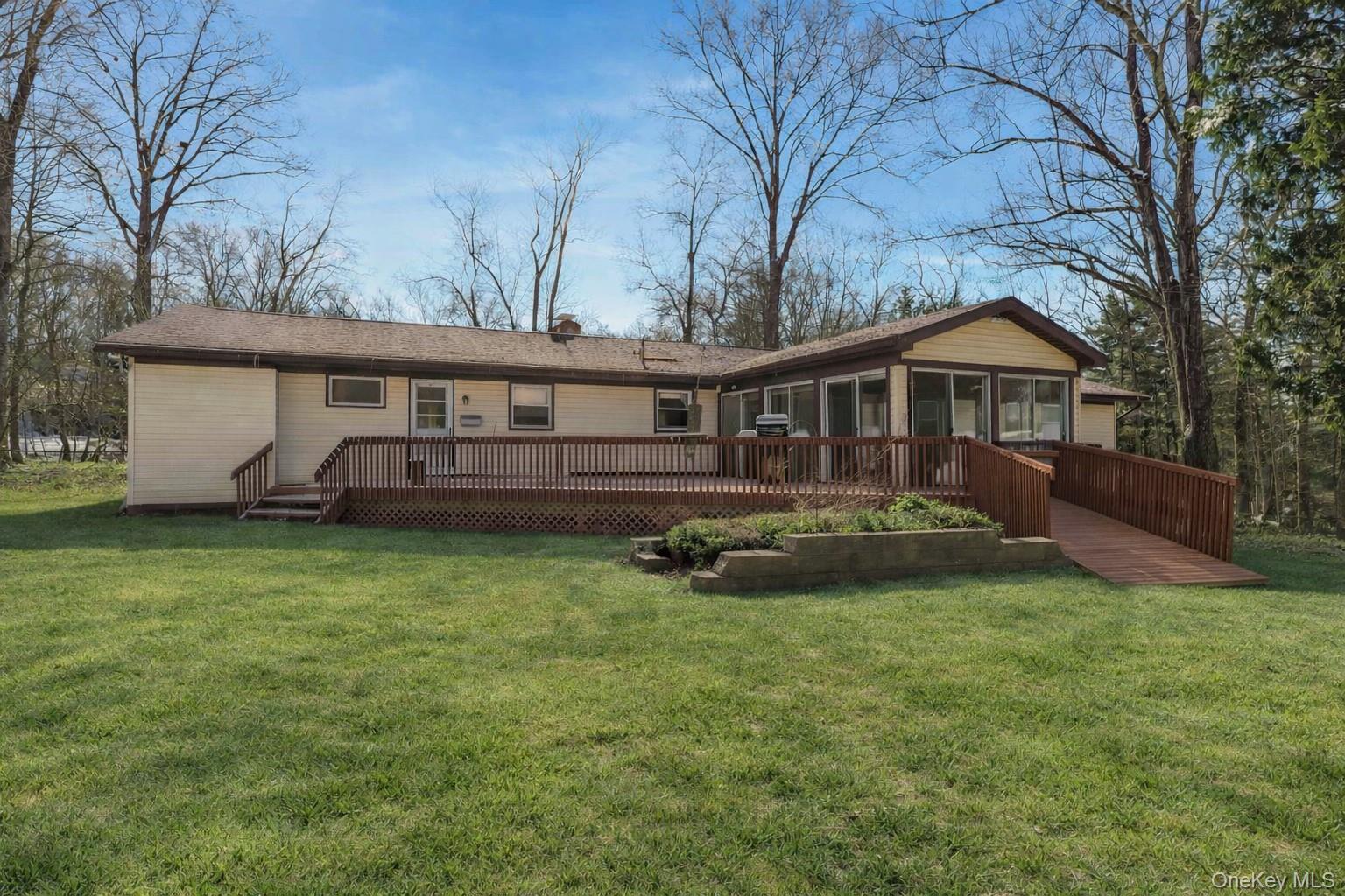 61 Rolling Ridge Road New City, NY 10956 - Photo 3 of 43 a view of a house with backyard and sitting area