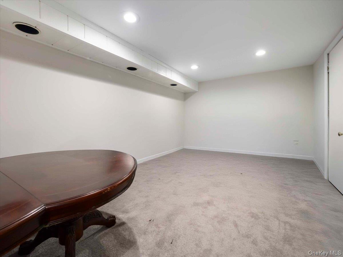 61 Rolling Ridge Road New City, NY 10956 - Photo 31 of 43 an empty room with a workbench
