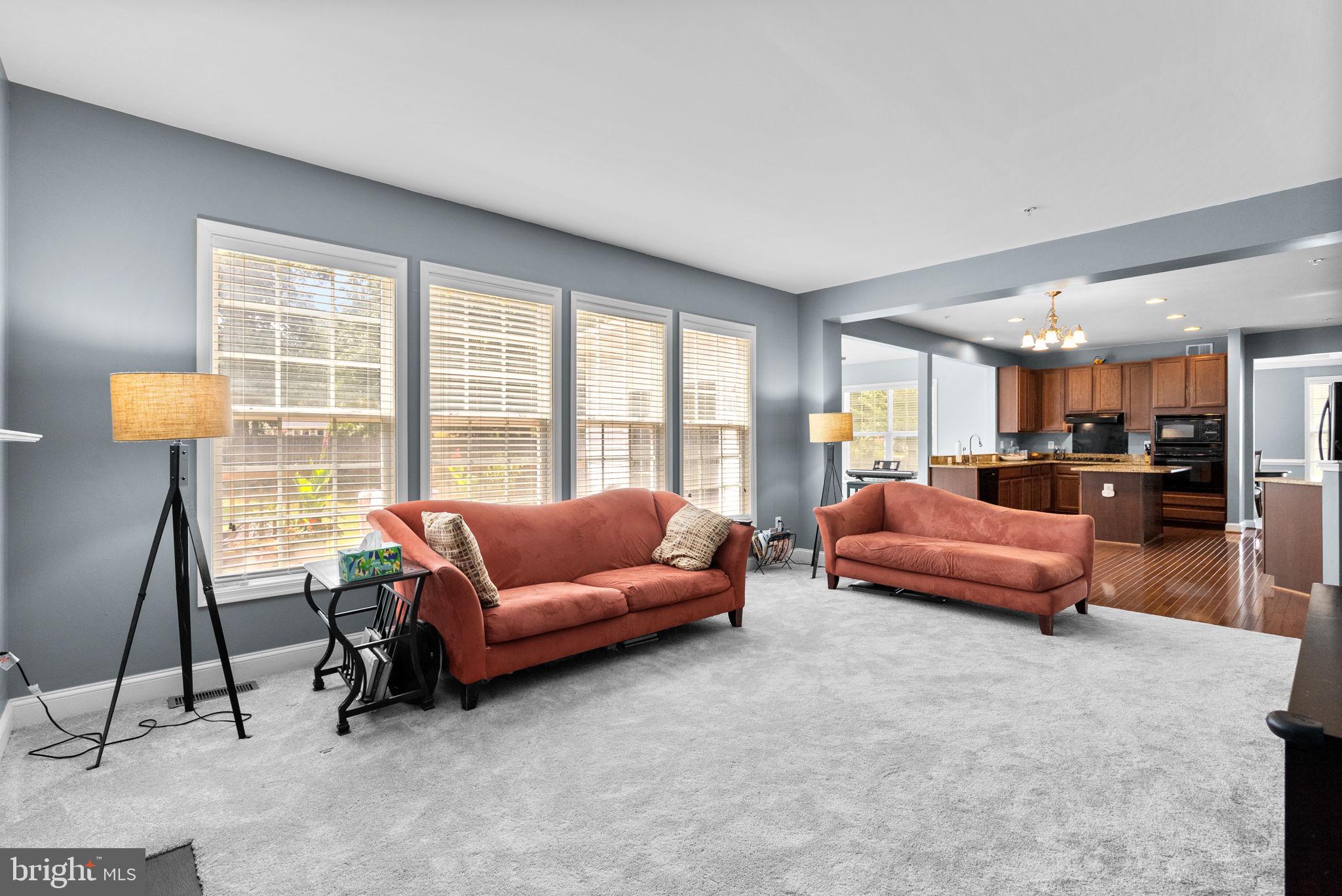 8301 Cedar View Court Clinton, MD 20735 - Photo 12 of 32 a living room with furniture and a large window