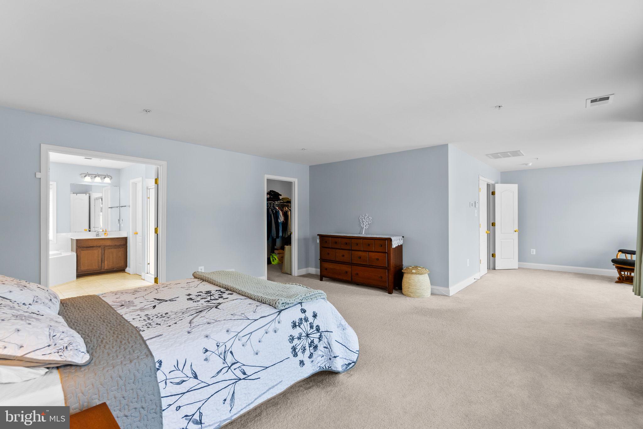 8301 Cedar View Court Clinton, MD 20735 - Photo 16 of 32 a bedroom with a bed and a television