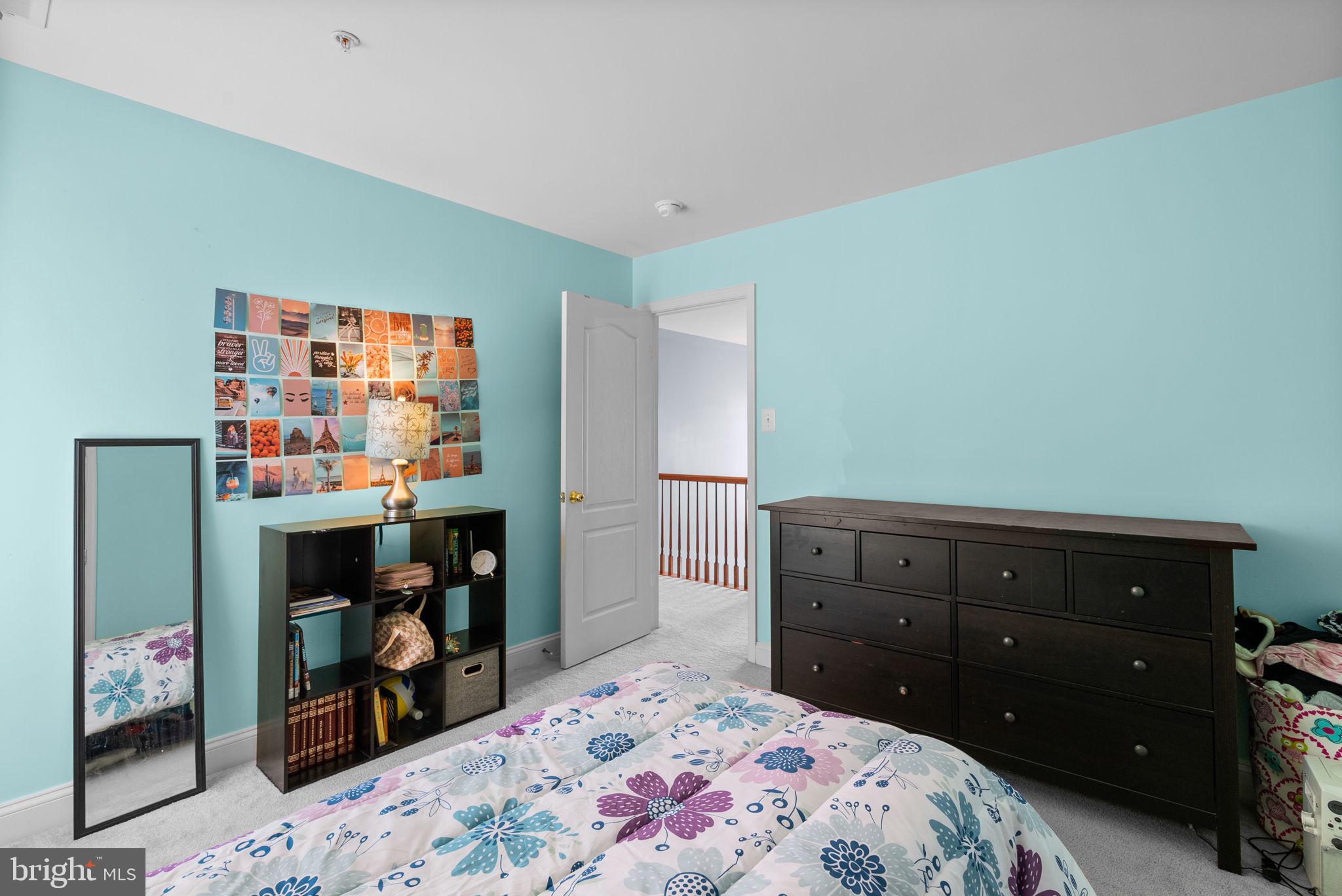 8301 Cedar View Court Clinton, MD 20735 - Photo 19 of 32 a bedroom with a bed and a dresser