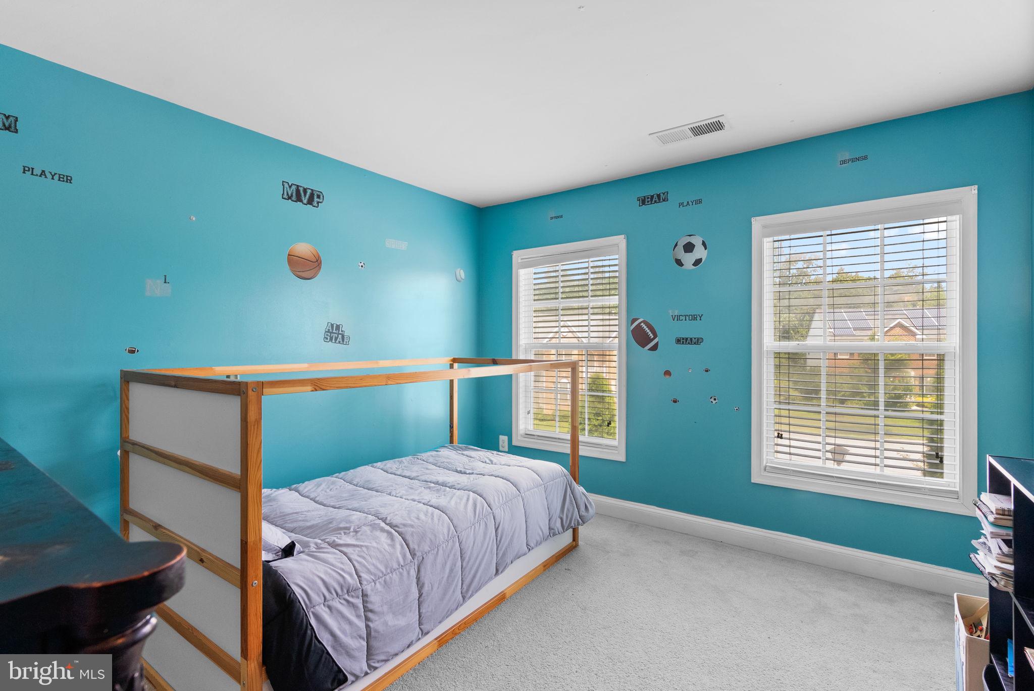 8301 Cedar View Court Clinton, MD 20735 - Photo 20 of 32 a bedroom with a bed and a window