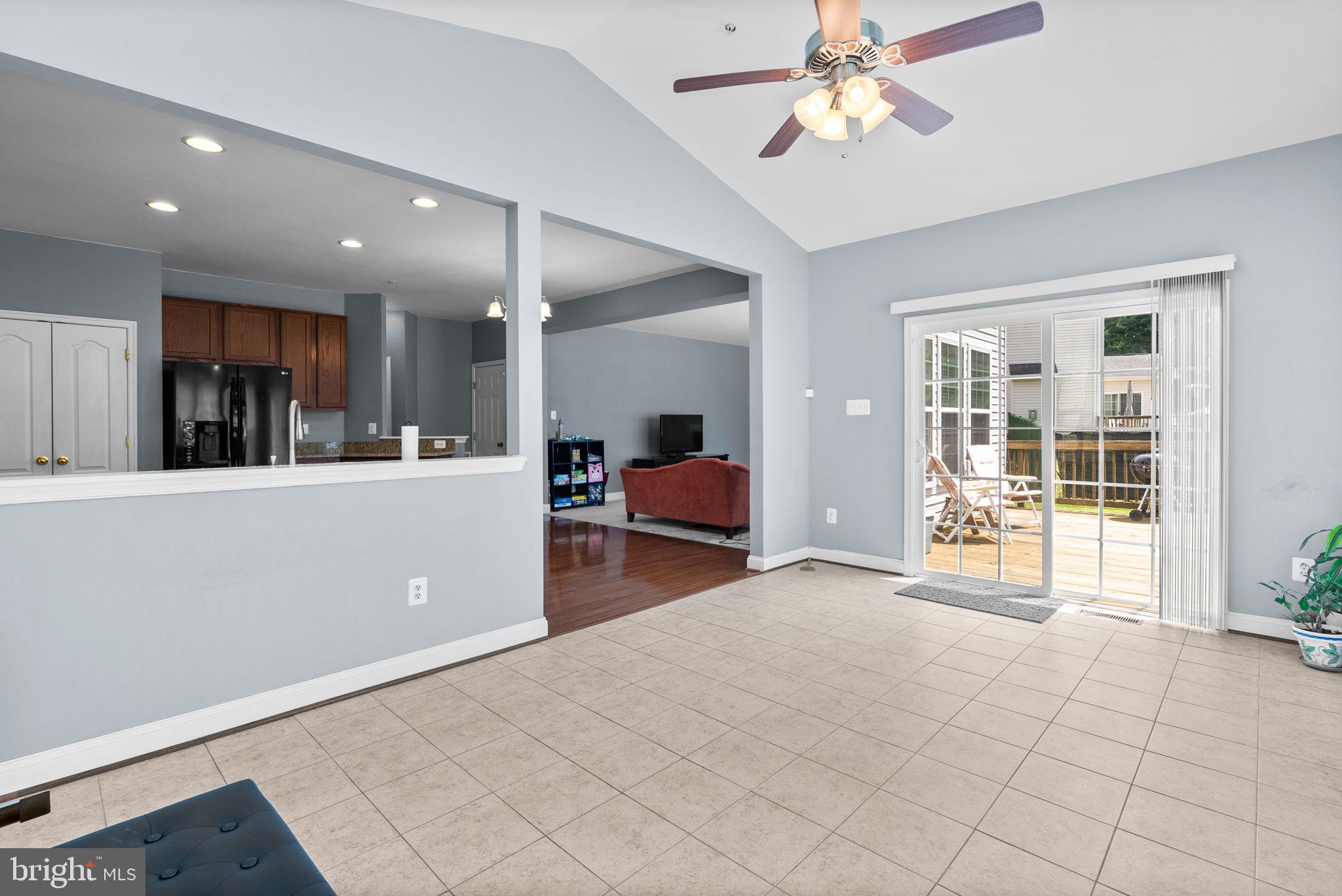 8301 Cedar View Court Clinton, MD 20735 - Photo 10 of 32 a living room with furniture and a large window