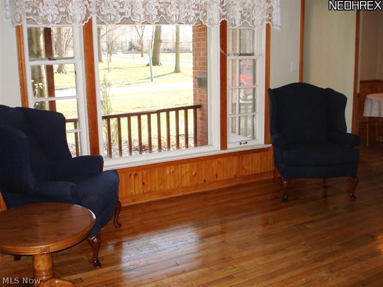 1784 Sunview Road Cleveland, OH 44124 - Photo 9 of 20 Refinished hardwood floors accent this warm livingroom with picture window overlooking front porch